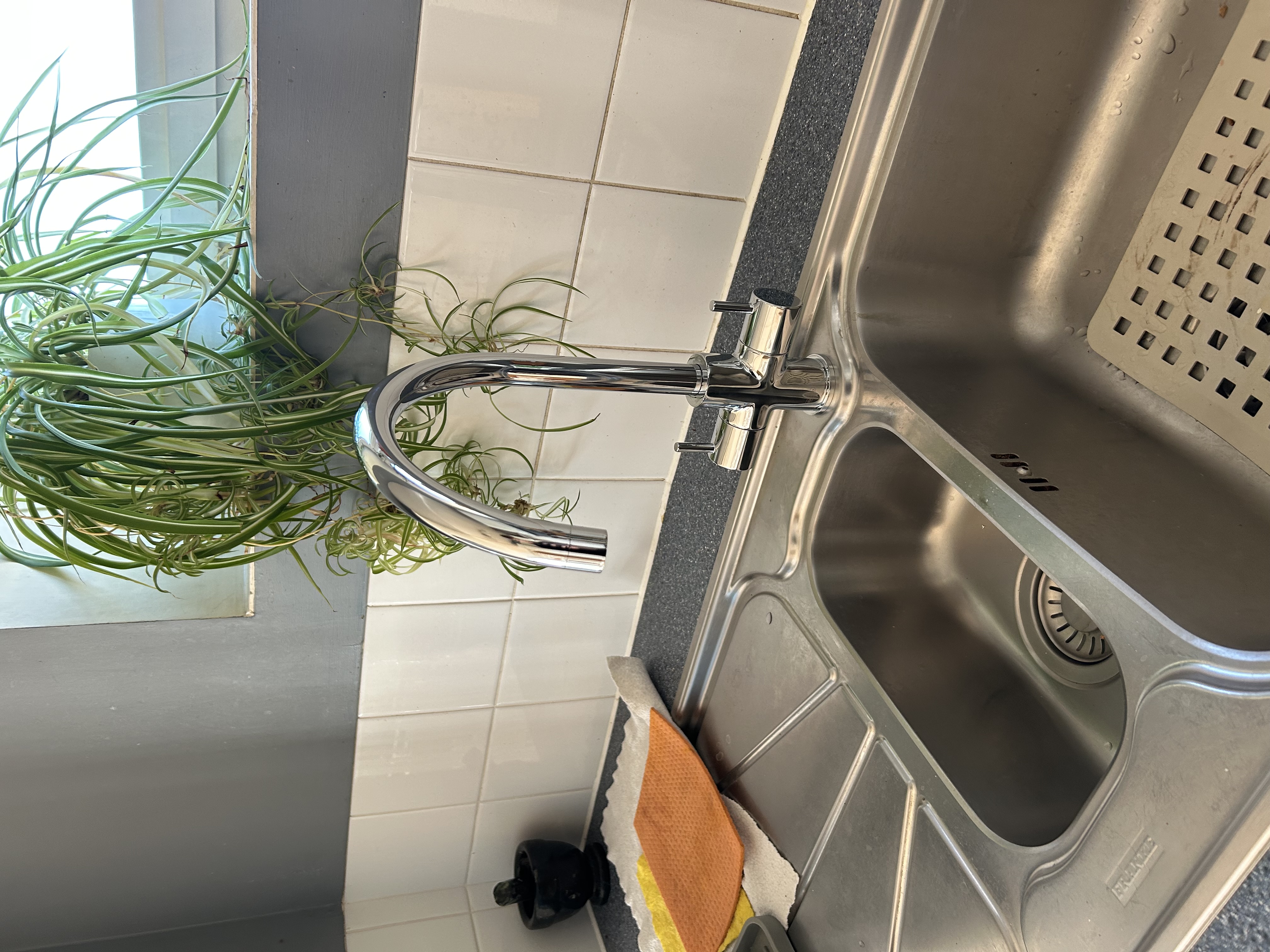 Kitchen sink and mixer tap installation