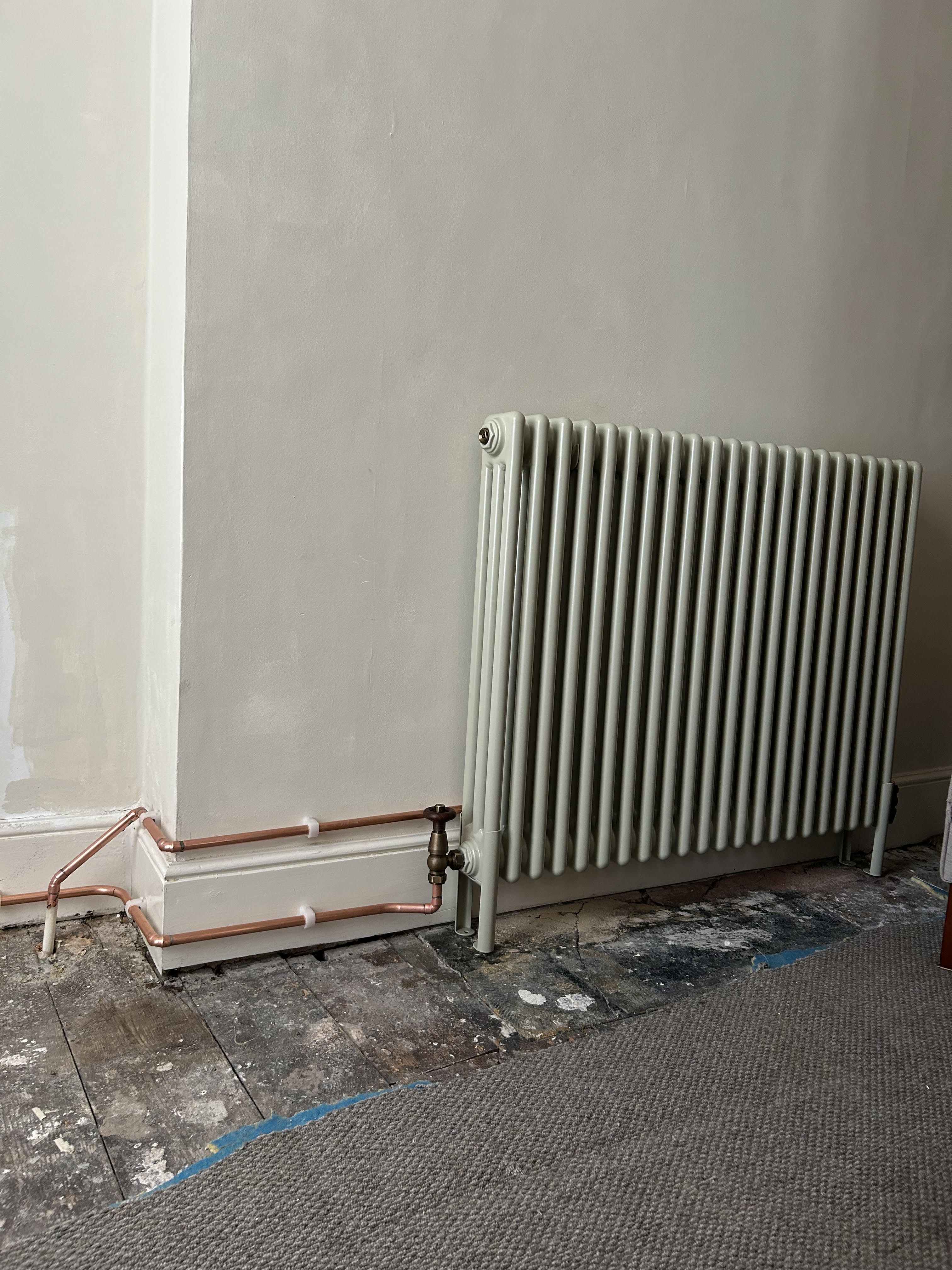 White column radiator installation in Finsbury Park